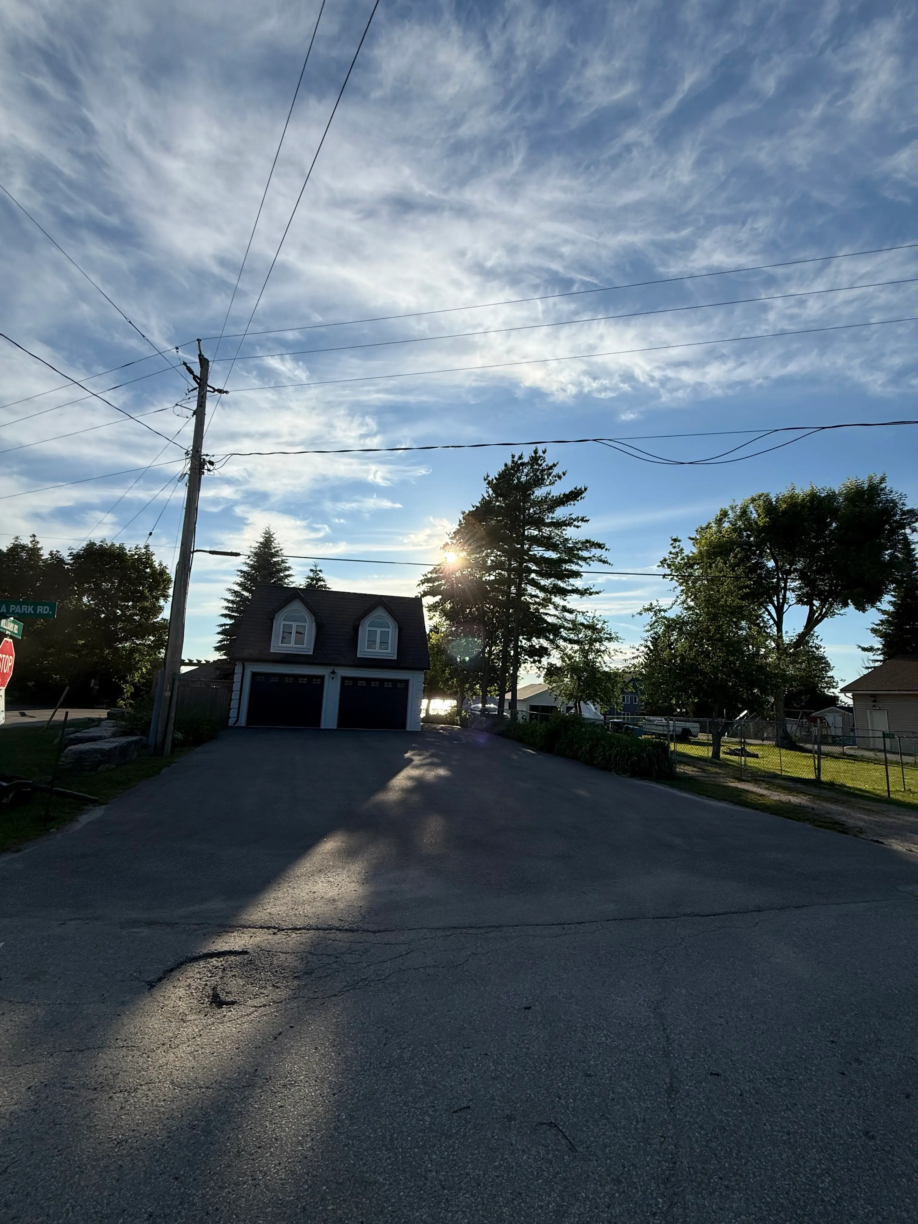 Before driveway sealing at a residential driveway in Orillia, ON.